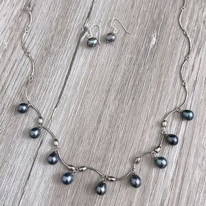 Sterling silver wavy teardrop black Tahitian pearl necklace and earrings